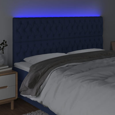 sengegavl med LED-lys 200x7x118/128 cm stof blå